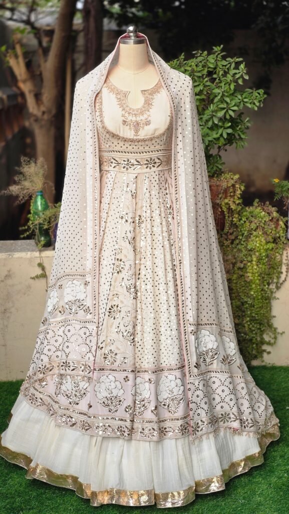 Ivory and gold bespoke bridal lehenga with an embroidered dupatta, made to measure in London